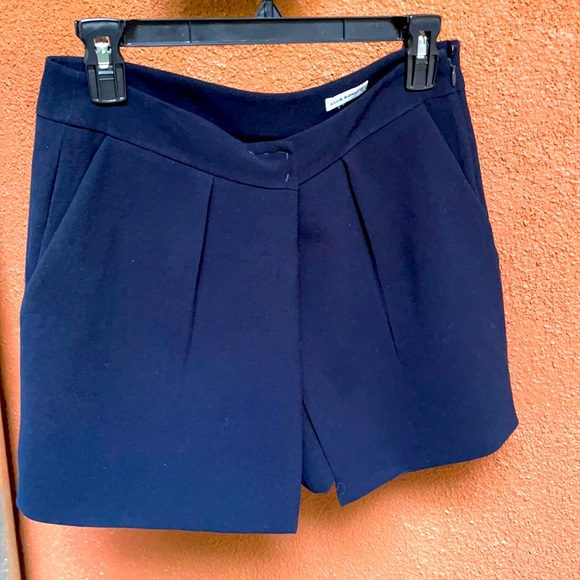 Navy pleated front skort. - Picture 1 of 3